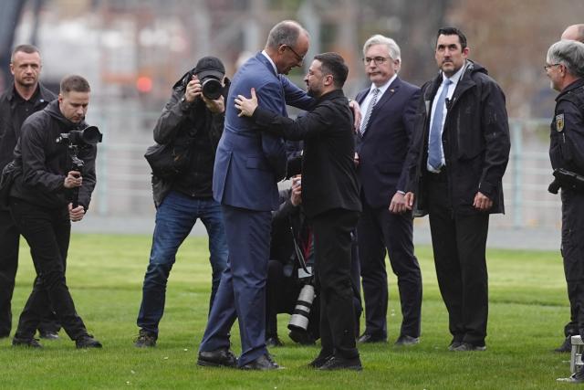 14 April 2026, Berlin: Friedrich Merz (L), Germany's Chancellor, welcomes Volodymyr Zelensky, Ukraine's President, in front of the Federal Chancellery for the first German-Ukrainian government consultations in many years. Photo: Kay Nietfeld/dpa