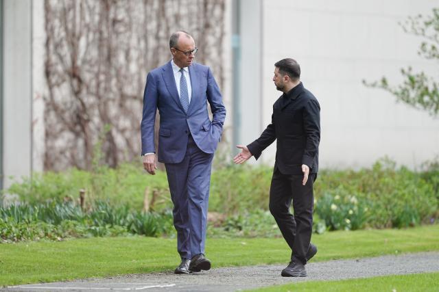 14 April 2026, Berlin: Friedrich Merz (L), Germany's Chancellor, welcomes Volodymyr Zelensky, Ukraine's President, in front of the Federal Chancellery for the first German-Ukrainian government consultations in many years. Photo: Kay Nietfeld/dpa
