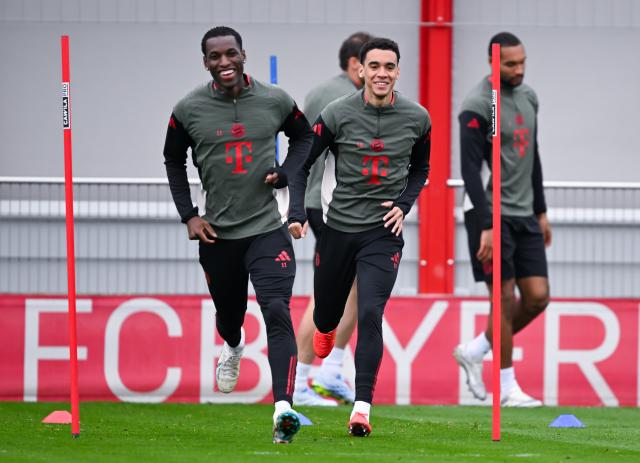 14 April 2026, Bavaria, Munich: (L-R) Bayern Munich's Nicolas Jackson, Jamal Musiala, and Jonathan Tah in action during a training session at the training facility on Saebener Strasse ahead of Wednesday's UEFA Champions League Quarter-final Second Leg soocer match against Real Madrid. Photo: Sven Hoppe/dpa