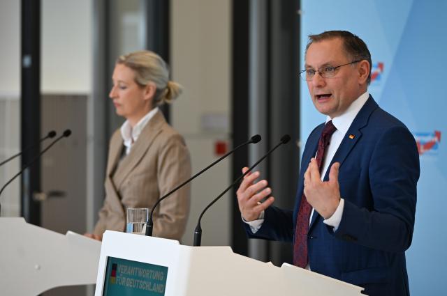 14 April 2026, Berlin: Tino Chrupalla (R) and Alice Weidel, Chairpersons and parliamentary group leaders of the Alternative for Germany (AfD), give a statement before the start of the parliamentary group meeting in the German Parliament Bundestag. Photo: Markus Lenhardt/dpa