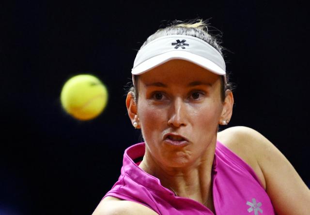 14 April 2026, Baden-Wuerttemberg, Stuttgart: Belgian tennis player Elise Mertens in action against Germany's Ella Seidel during their women's singles round of 32 match of the Stuttgart Open tennis tournament. Photo: Marijan Murat/dpa