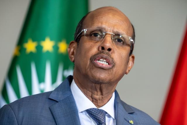 14 April 2026, Berlin: Mahmoud Ali Youssouf, President of the African Union, speaks during a joint press conference with German Chancellor Friedrich Merz at the Federal Chancellery. Photo: Michael Kappeler/dpa
