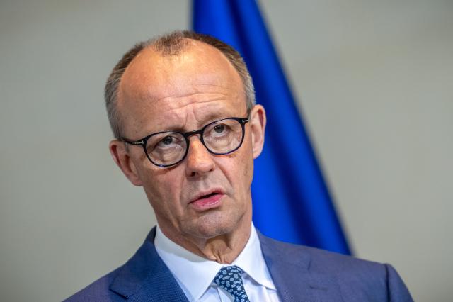 14 April 2026, Berlin: German Chancellor Friedrich Merz speaks during a joint press conference with Mahmoud Ali Youssouf, President of the African Union, at the Federal Chancellery. Photo: Michael Kappeler/dpa