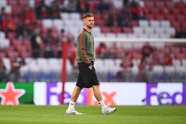 15 April 2026, Bavaria, Munich: Bayern Munich's Joshua Kimmich inspects the pitch prior to the start of the UEFA Champions League Quarterfinal Second Leg soccer match between Bayern Munich and Real Madrid at Allianz Arena. Photo: Tom Weller/dpa