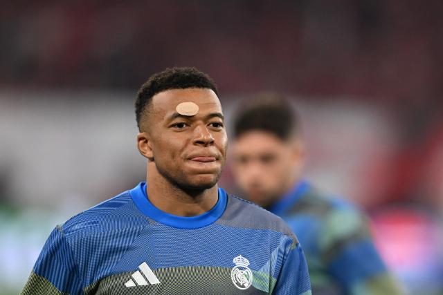 15 April 2026, Bavaria, Munich: Real Madrid's Kylian Mbappe warms up prior to the start of the UEFA Champions League Quarterfinal Second Leg soccer match between Bayern Munich and Real Madrid at Allianz Arena. Photo: Sven Hoppe/dpa