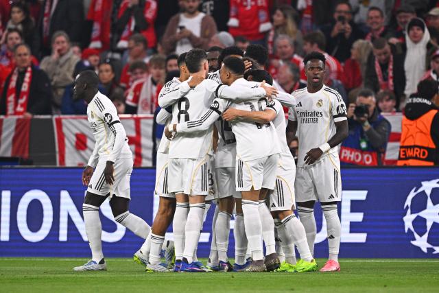 15 April 2026, Bavaria, Munich: Real Madrid players celebrate their side's first goal during the UEFA Champions League Quarterfinal Second Leg soccer match between Bayern Munich and Real Madrid at Allianz Arena. Photo: Tom Weller/dpa