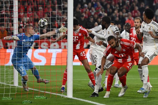 15 April 2026, Bavaria, Munich: Bayern Munich's Aleksandar Pavlovic (2nd L) scores his side's first goal during the UEFA Champions League Quarterfinal Second Leg soccer match between Bayern Munich and Real Madrid at Allianz Arena. Photo: Sven Hoppe/dpa