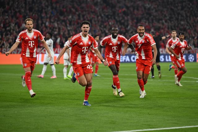 15 April 2026, Bavaria, Munich: Bayern Munich's Aleksandar Pavlovic (2nd L) celebrates scoring his side's first goal with teammates during the UEFA Champions League Quarterfinal Second Leg soccer match between Bayern Munich and Real Madrid at Allianz Arena. Photo: Sven Hoppe/dpa