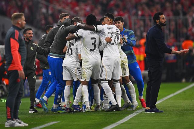 15 April 2026, Bavaria, Munich: Real Madrid players celebrate their side's second goal during the UEFA Champions League Quarterfinal Second Leg soccer match between Bayern Munich and Real Madrid at Allianz Arena. Photo: Tom Weller/dpa