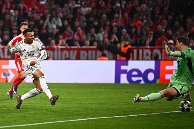 15 April 2026, Bavaria, Munich: Real Madrid's Kylian Mbappe scores his side's third goal during the UEFA Champions League Quarterfinal Second Leg soccer match between Bayern Munich and Real Madrid at Allianz Arena. Photo: Tom Weller/dpa