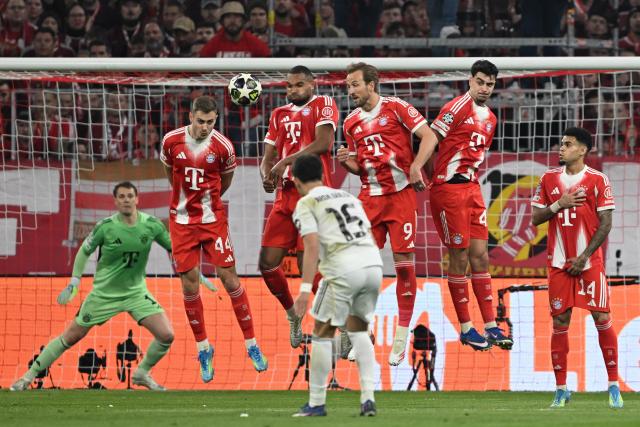 15 April 2026, Bavaria, Munich: Real Madrid's Arda Gueler (C) scores his side's second goal during the UEFA Champions League Quarterfinal Second Leg soccer match between Bayern Munich and Real Madrid at Allianz Arena. Photo: Sven Hoppe/dpa