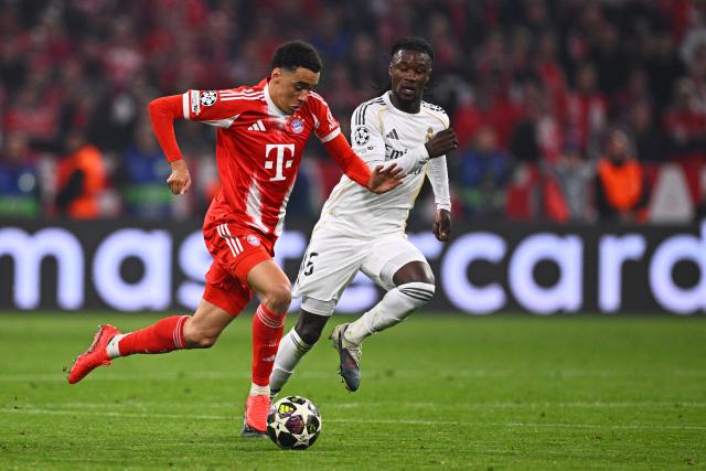 15 April 2026, Bavaria, Munich: Real Madrid's Eduardo Camavinga (R) and Bayern Munich's Jamal Musiala battle for the ball during the UEFA Champions League Quarterfinal Second Leg soccer match between Bayern Munich and Real Madrid at Allianz Arena. Photo: Tom Weller/dpa