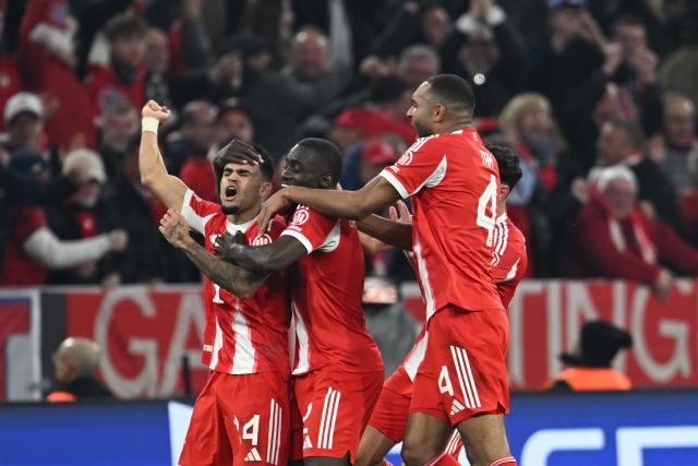 15 April 2026, Bavaria, Munich: Bayern Munich's Luis Diaz celebrates scoring his side's third goal with teammates Dayot Upamecano (C) and Jonathan Tah (R) during the UEFA Champions League Quarterfinal Second Leg soccer match between Bayern Munich and Real Madrid at Allianz Arena. Photo: Sven Hoppe/dpa