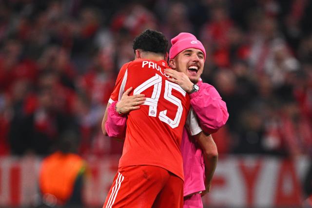 15 April 2026, Bavaria, Munich: Bayern Munich's Lennart Karl (R) and Aleksandar Pavlovic celebrate after the UEFA Champions League Quarterfinal Second Leg soccer match between Bayern Munich and Real Madrid at Allianz Arena. Photo: Tom Weller/dpa
