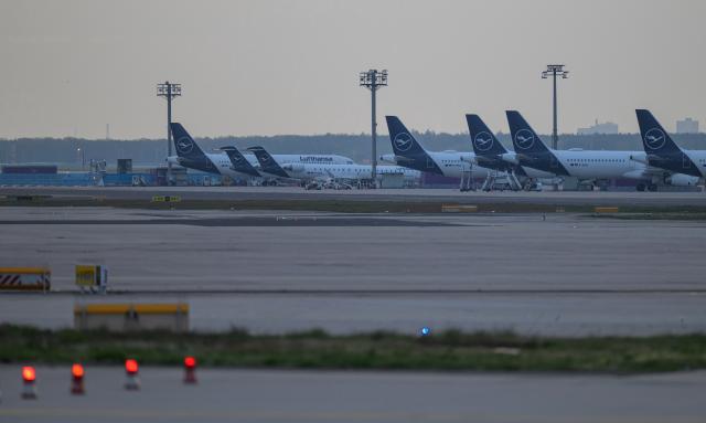 16 April 2026, Hesse, Frankfurt/Main: Lufthansa aircraft are parked at Frankfurt Airport on the second day of strikes by the cabin crew union Ufo, while the pilots' union VC has announced full-day strikes. Photo: Hannes P. Albert/dpa