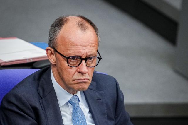 16 April 2026, Berlin: Friedrich Merz, Germany's Chancellor, attends a plenary session of the German Bundestag, where the agenda includes the first reading of a bill to reduce energy taxes. Photo: Kay Nietfeld/dpa