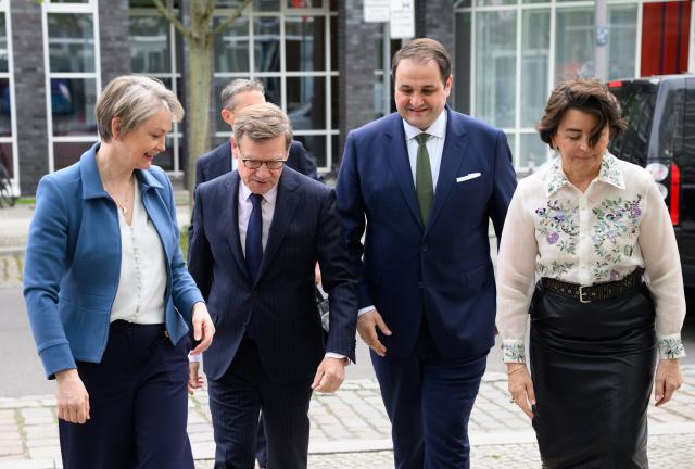 16 April 2026, Berlin: (L-R) Yvette Cooper, UK's Foreign Secretary, Johann Wadephul, Germany's Foreign Minister; Nathanael Liminski, Germany's Minister for Federal and European Affairs, International Affairs, and Media of the State of North Rhine-Westphalia; and Anne Ruth Herkes, Chair of the German-British Society, are heading to the German-British Society's 'New Koenigswinter Future Lab' at the State of North Rhine-Westphalia's Representative Office to the Federal Government. Photo: Bernd von Jutrczenka/dpa