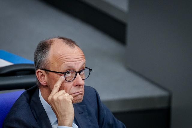 16 April 2026, Berlin: Friedrich Merz, Germany's Chancellor, attends a plenary session of the German Bundestag, where the agenda includes the first reading of a bill to reduce energy taxes. Photo: Kay Nietfeld/dpa
