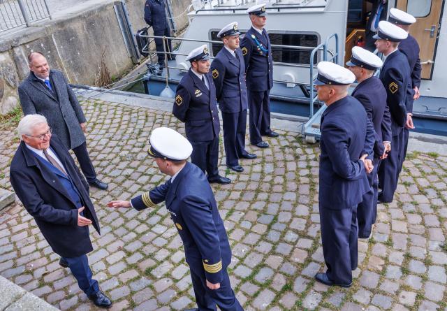 16 April 2026, Mecklenburg-Western Pomerania, Stralsund: Germany's President Frank-Walter Steinmeier travels across the Strelasund on a naval vessel ahead of a visit to the Naval Technical School. As part of his "Local Time Germany" tour, the Federal President is relocating his official residence to Stralsund until April 16. Photo: Jens Büttner/dpa