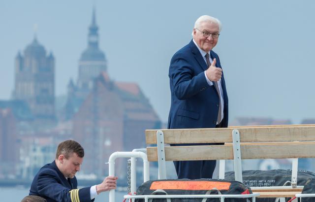 16 April 2026, Mecklenburg-Western Pomerania, Stralsund: Germany's President Frank-Walter Steinmeier travels across the Strelasund on a naval vessel ahead of a visit to the Naval Technical School. As part of his "Local Time Germany" tour, the Federal President is relocating his official residence to Stralsund until April 16. Photo: Jens Büttner/dpa