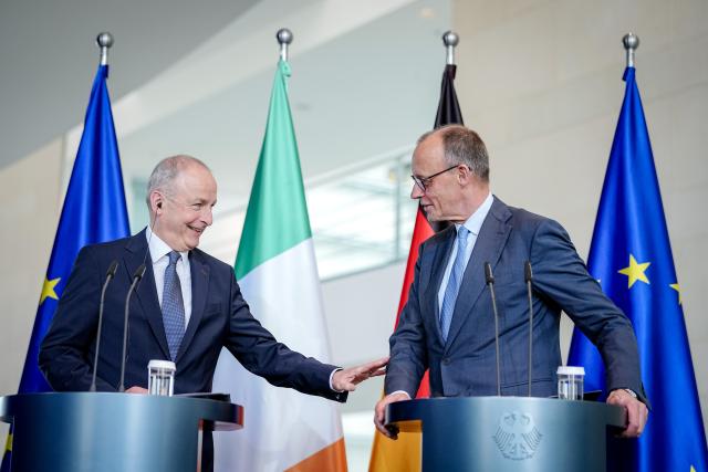 16 April 2026, Berlin: Germany's Chancellor Friedrich Merz (R) and Irish Prime Minister Micheal Martin hold a press conference at the Federal Chancellery. Ireland will take over the EU Council Presidency in the second half of 2026. Photo: Kay Nietfeld/dpa