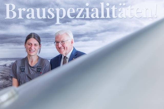 16 April 2026, Mecklenburg-Western Pomerania, Stralsund: German President Frank-Walter Steinmeier (R) visits the Störtebeker Brewery alongside Juliane Eiser, the brewery's second master brewer, as part of his "Local Time Germany" tour. Photo: Jens Büttner/dpa