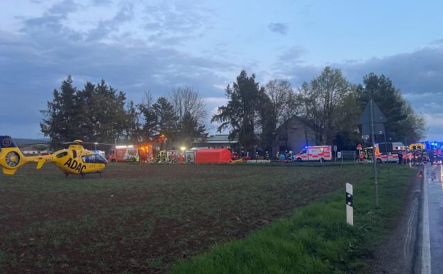 16 April 2026, Hesse, Runkel: Emergency workers stand on the scene after an accident at a leather factory and fur tannery in Runkel. Several people have lost their lives and others were seriously injured and taken to hospitals. Photo: Sascha Ditscher/dpa