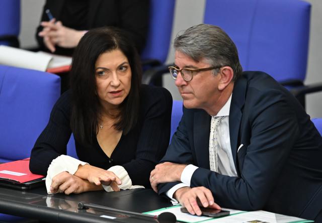 17 April 2026, Berlin: Katherina Reiche, German Minister for Economic Affairs and Energy, and Wolfram Weimer, Minister of State for Culture and the Media, talk during a session in the plenary chamber of the Bundestag. Photo: Markus Lenhardt/dpa
