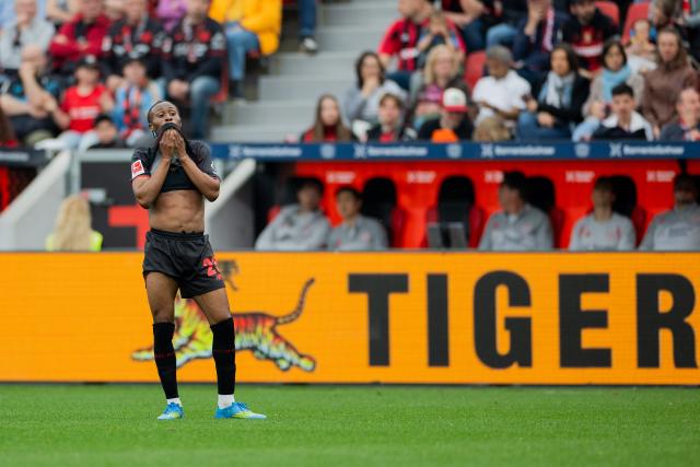 18 April 2026, North Rhine-Westphalia, Leverkusen: Bayer Leverkusen's Nathan Tella reacts during the German Bundesliga soccer match between Bayer Leverkusen and FC Augsburg at BayArena. Photo: Rolf Vennenbernd/dpa - WICHTIGER HINWEIS: Gemäß den Vorgaben der DFL Deutsche Fußball Liga bzw. des DFB Deutscher Fußball-Bund ist es untersagt, in dem Stadion und/oder vom Spiel angefertigte Fotoaufnahmen in Form von Sequenzbildern und/oder videoähnlichen Fotostrecken zu verwerten bzw. verwerten zu lassen.