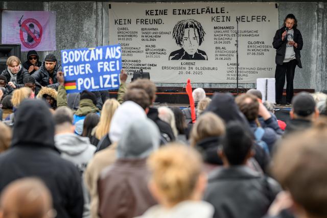 19 April 2026, Lower Saxony, Oldenburg: Soniya Alkis, activist at Initiative Justice for Lorenz, gives a speech at the rally one year after Lorenz, the 21-year-old Black man, died of wounds sustained after being shot by a police officer following an altercation outside a nightclub. Photo: Izabela Mittwollen/dpa