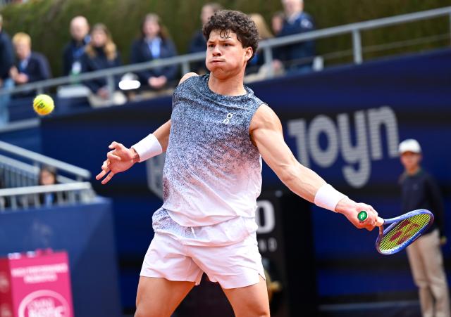 19 April 2026, Bavaria, Munich: US tennis player Ben Shelton in action in action against Italy's Flavio Cobolli during their men's singles final match of the ATP Tour BMW Open by Bitpanda in Munich. Photo: Sven Hoppe/dpa