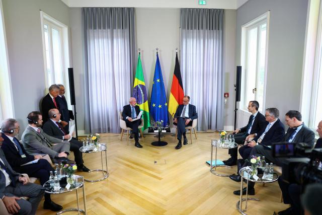 19 April 2026, Lower Saxony, Hanover: German Chancellor Friedrich Merz meets with Brazilian President Luiz Inacio Lula da Silva in Hanover. Photo: Lisi Niesner/Reuters/Pool/dpa