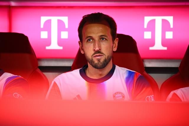 19 April 2026, Bavaria, Munich: Bayern Munich's Harry Kane sits on the bench during the German Bundesliga championship trophy ahead of the German Bundesliga soccer match between Bayern Munich and VfB Stuttgart at Allianz Arena. Photo: Tom Weller/dpa - IMPORTANT NOTICE: DFL and DFB regulations prohibit any use of photographs as image sequences and/or quasi-video.