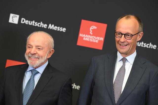 19 April 2026, Lower Saxony, Hanover: Germany's Chancellor Friedrich Merz (R) and Brazilian President Luiz Inacio Lula da Silva attend the opening of the Hanover Trade Fair. Photo: Julian Stratenschulte/dpa