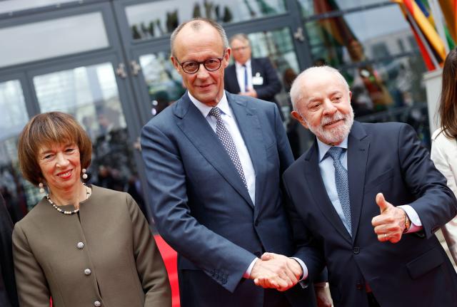 19 April 2026, Lower Saxony, Hanover: Germany's Chancellor Friedrich Merz (C) and Brazilian President Luiz Inacio Lula da Silva attend the opening of the Hanover Trade Fair. Photo: Michael Matthey/dpa