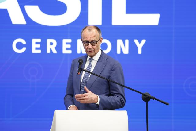 20 April 2026, Lower Saxony, Hanover: German Chancellor Friedrich Merz speaks at the Brazilian business stand during the opening tour of the Hannover Messe. Brazil is the partner country at this year's Hannover Messe. Photo: Moritz Frankenberg/dpa