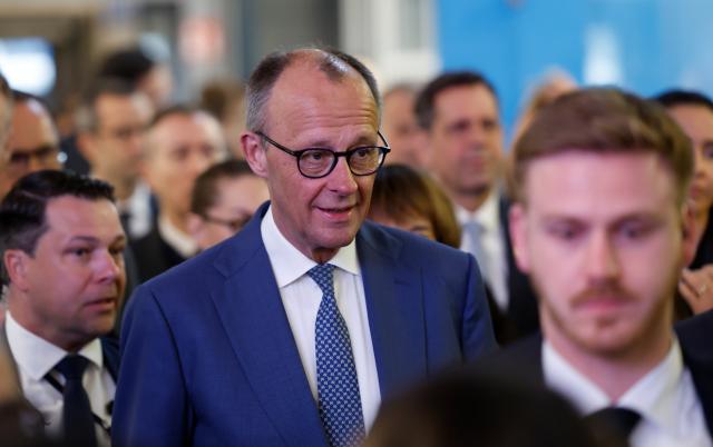20 April 2026, Lower Saxony, Hanover: German Chancellor Friedrich Merz begins his tour of the Hannover Messe. Brazil is the partner country at this year's Hannover Messe. Photo: Michael Matthey/dpa