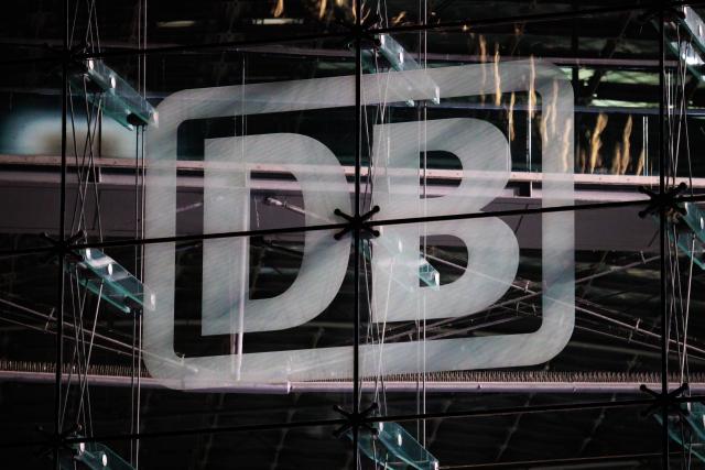 FILED - 13 February 2026, Berlin: The "DB" logo of Deutsche Bahn is seen on the glass facade of Berlin Central Station. Photo: Carsten Koall/dpa
