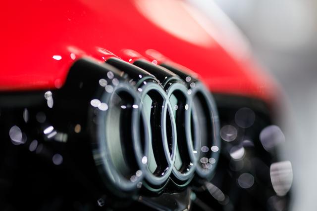 FILED - 17 March 2026, Bavaria, Ingolstadt: The logo of the car manufacturer Audi can be seen on a vehicle during the Audi annual press conference. Photo: Daniel Karmann/dpa