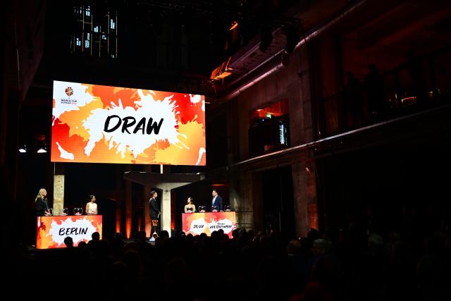 21 April 2026, Berlin: Former handball player Stefan Kretzschmar (R), and breakdancer Jilou (2nd R) take part in the draw ceremony for the 2026 FIBA Women's Basketball World Cup. The World Cup will take place in Berlin from September 4 to 13. Photo: Sebastian Gollnow/dpa