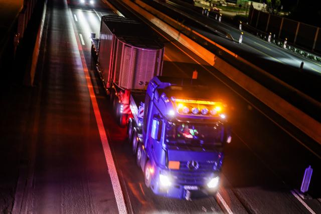 22 April 2026, North Rhine-Westphalia, Ahaus: The convoy of the second Castor container of nuclear waste, drives past the Bottrop south service area on the A2 highway. Photo: Christoph Reichwein/dpa