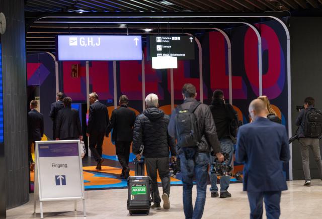 22 April 2026, Hesse, Frankfurt/Main: People walk through a corridor in the new Terminal 3 at Frankfurt Airport. The new Passenger Terminal 3 at Frankfurt Airport will be opened with a ceremony this Wednesday. Photo: Boris Roessler/dpa