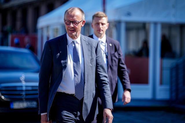 22 April 2026, Berlin: German Chancellor Friedrich Merz attends the 17th Petersburg Climate Dialogue in Berlin. Ministers from more than 30 countries as well as high-ranking people from civil society, science, the financial sector and business are expected to attend. Photo: Kay Nietfeld/dpa