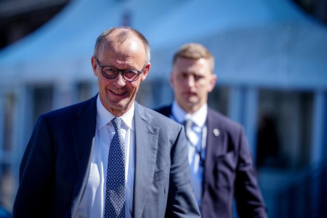 22 April 2026, Berlin: German Chancellor Friedrich Merz attends the 17th Petersburg Climate Dialogue in Berlin. Ministers from more than 30 countries as well as high-ranking people from civil society, science, the financial sector and business are expected to attend. Photo: Kay Nietfeld/dpa