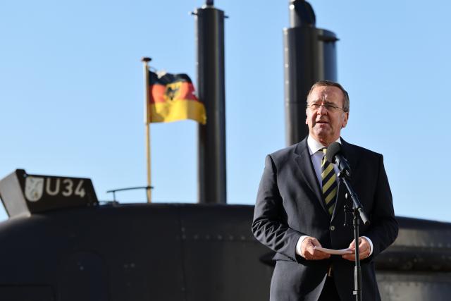 22 April 2026, Schleswig-Holstein, Kiel: Boris Pistorius, Germany's Defence Minister, and his Indian counterpart Rajnath Singh visit submarine manufacturer Thyssenkrupp Marine Systems (TKMS) and issue a statement, with the German Navy submarine U34 of the Type 212A class visible in the background. Photo: Christian Charisius/dpa