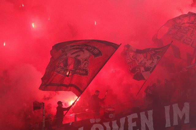 22 April 2026, North Rhine-Westphalia, Leverkusen: Bayer Leverkusen fans set off pyrotechnics ahead of the the German DFB Cup semifinal soccer match between Bayer Leverkusen and Bayern Munich at BayArena. Photo: Rolf Vennenbernd/dpa - IMPORTANT NOTICE: DFL and DFB regulations prohibit any use of photographs as image sequences and/or quasi-video.