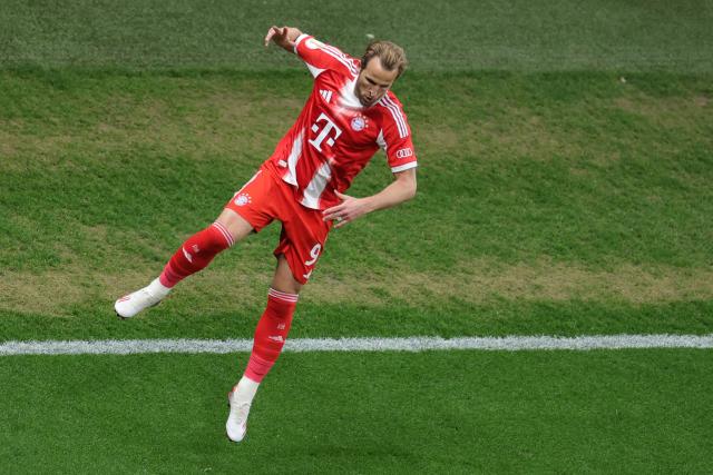 22 April 2026, North Rhine-Westphalia, Leverkusen: Bayern Munich's Harry Kane celebrates scoring his side's first goal during the German DFB Cup semifinal soccer match between Bayer Leverkusen and Bayern Munich at BayArena. Photo: Rolf Vennenbernd/dpa - IMPORTANT NOTICE: DFL and DFB regulations prohibit any use of photographs as image sequences and/or quasi-video.