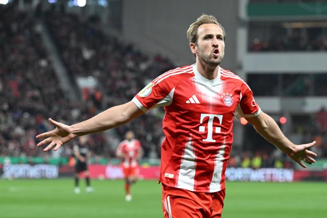 22 April 2026, North Rhine-Westphalia, Leverkusen: Bayern Munich's Harry Kane celebrates scoring his side's first goal during the German DFB Cup semifinal soccer match between Bayer Leverkusen and Bayern Munich at BayArena. Photo: Federico Gambarini/dpa - IMPORTANT NOTICE: DFL and DFB regulations prohibit any use of photographs as image sequences and/or quasi-video.