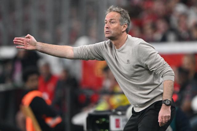 22 April 2026, North Rhine-Westphalia, Leverkusen: Bayer Leverkusen coach Kasper Hjulmand gestures on the sideline during the German DFB Cup semifinal soccer match between Bayer Leverkusen and Bayern Munich at BayArena. Photo: Federico Gambarini/dpa - IMPORTANT NOTICE: DFL and DFB regulations prohibit any use of photographs as image sequences and/or quasi-video.