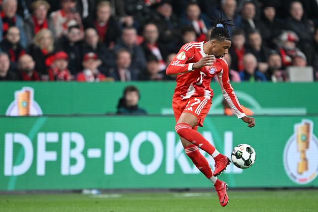 22 April 2026, North Rhine-Westphalia, Leverkusen: Bayern Munich's Michael Olise in action during the German DFB Cup semifinal soccer match between Bayer Leverkusen and Bayern Munich at BayArena. Photo: Federico Gambarini/dpa - IMPORTANT NOTICE: DFL and DFB regulations prohibit any use of photographs as image sequences and/or quasi-video.